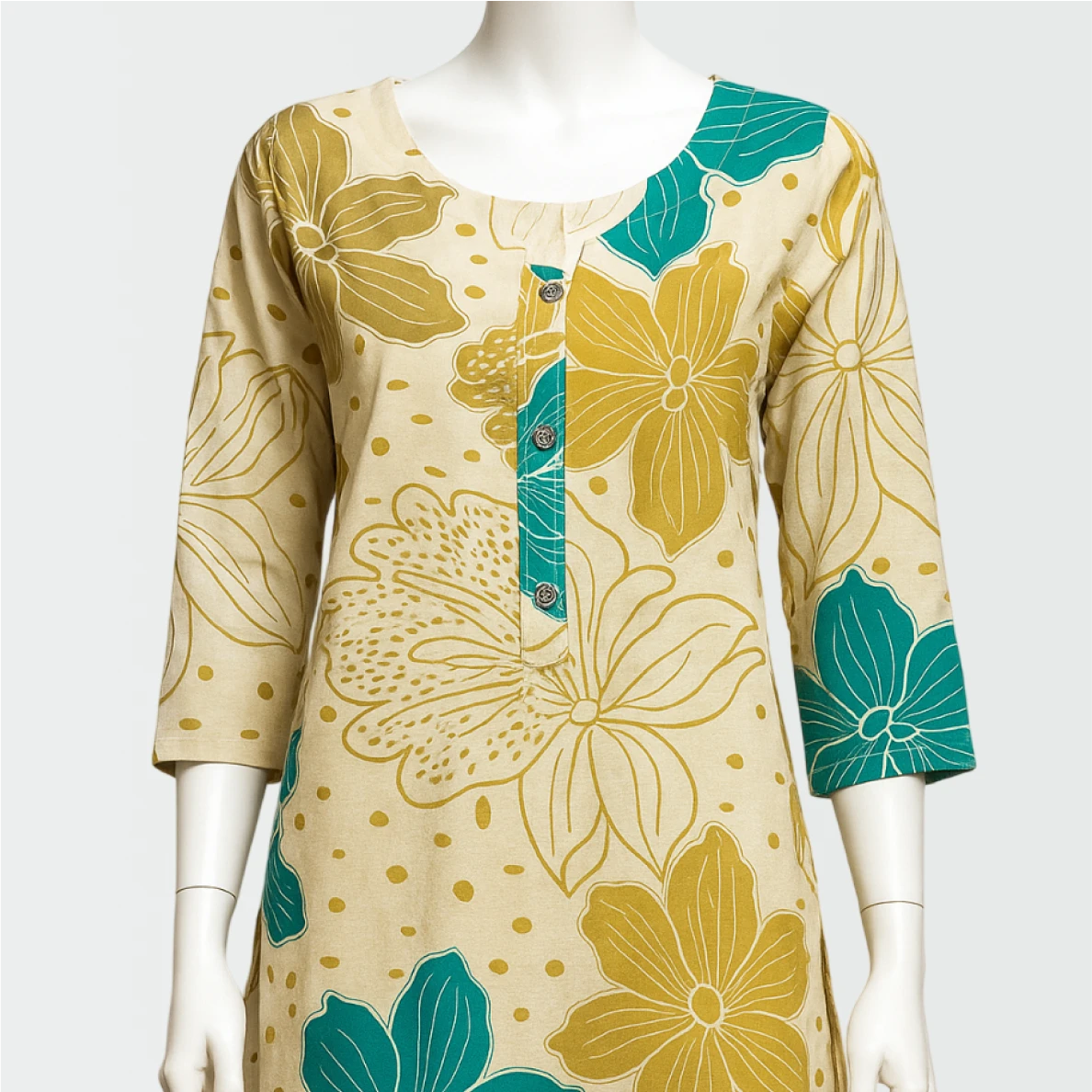 Beige dress with green and yellow floral patterns on a mannequin against a white background