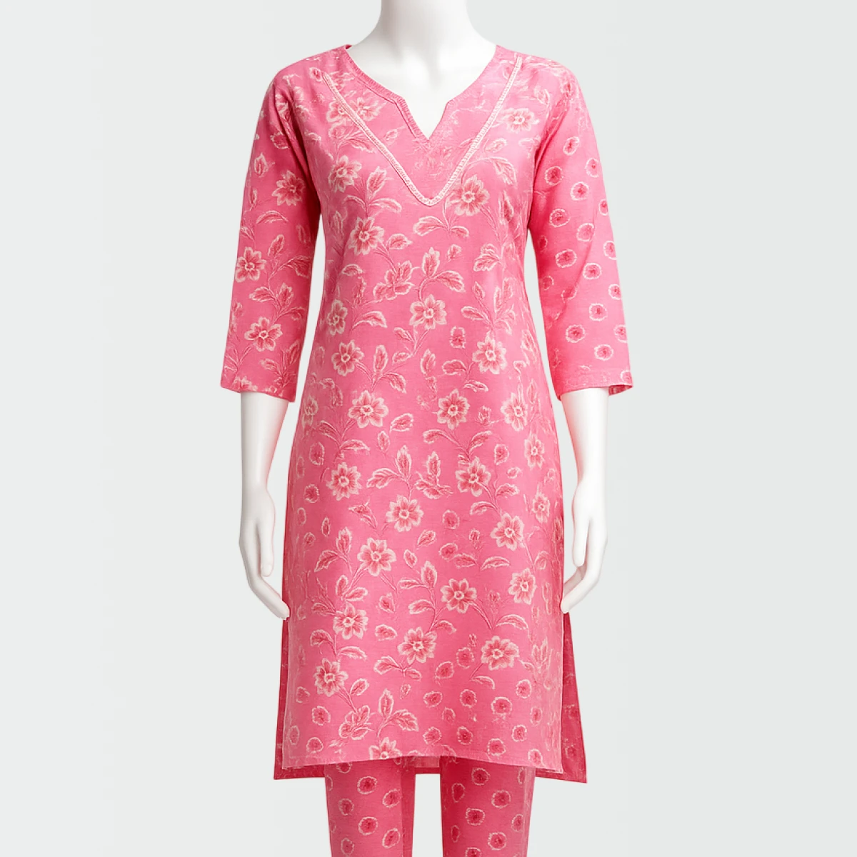 Pink floral patterned kurta on a mannequin against a white background
