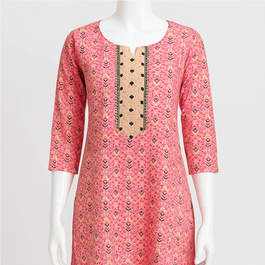 Pink patterned kurta on a mannequin against a white background