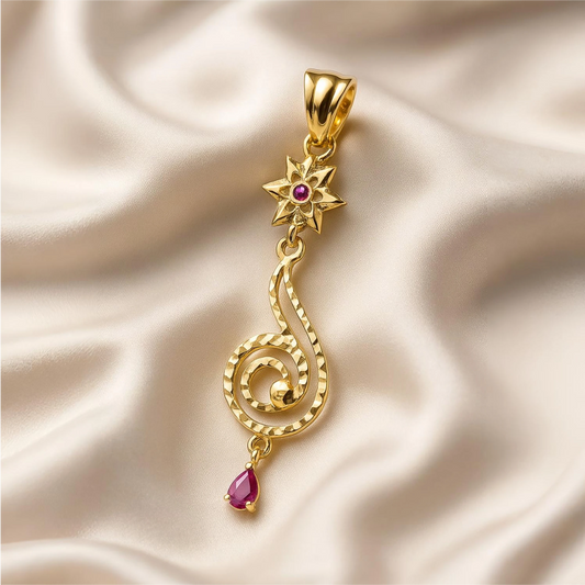 Gold pendant with red gemstones on a beige satin background