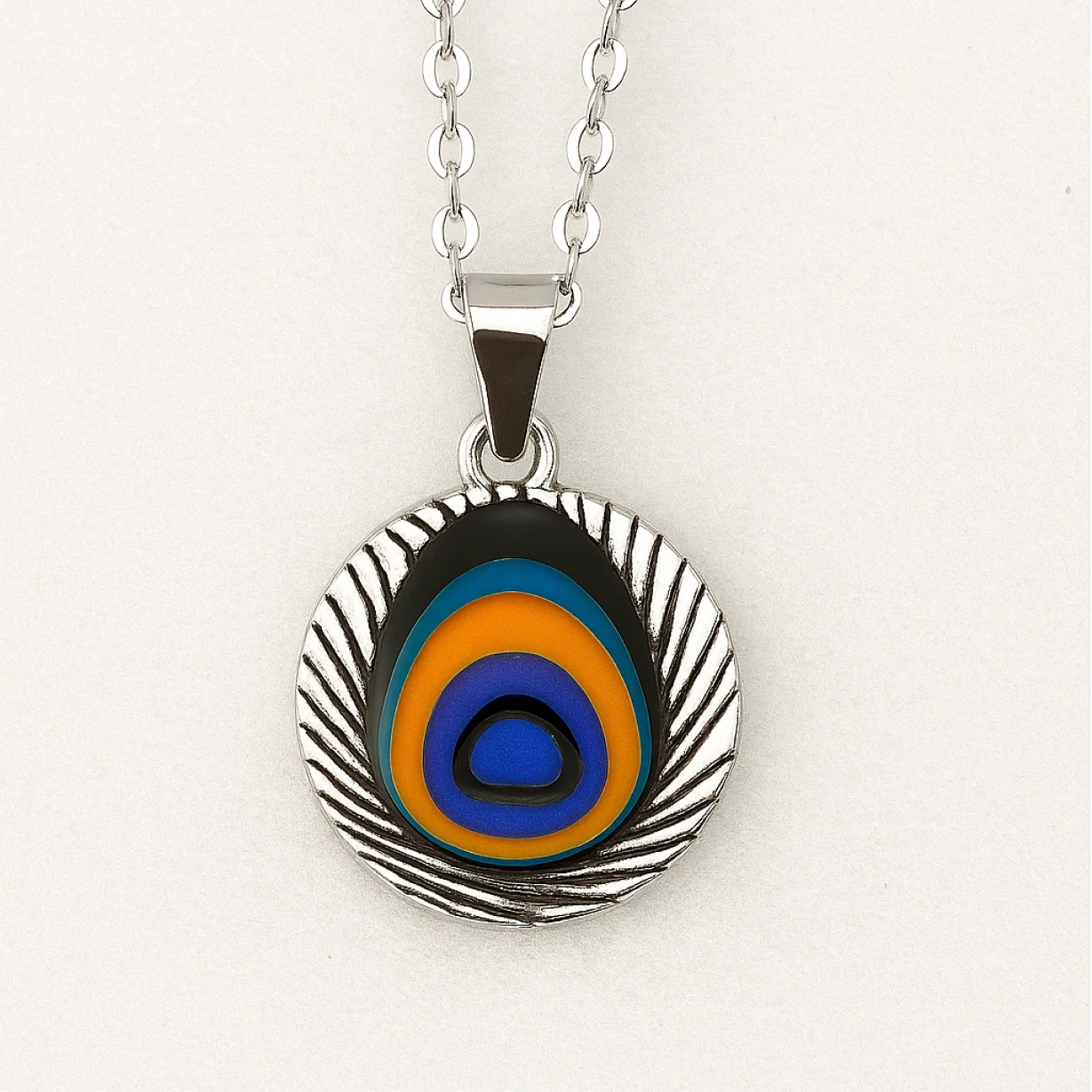 Necklace with a colorful circular pendant on a white background
