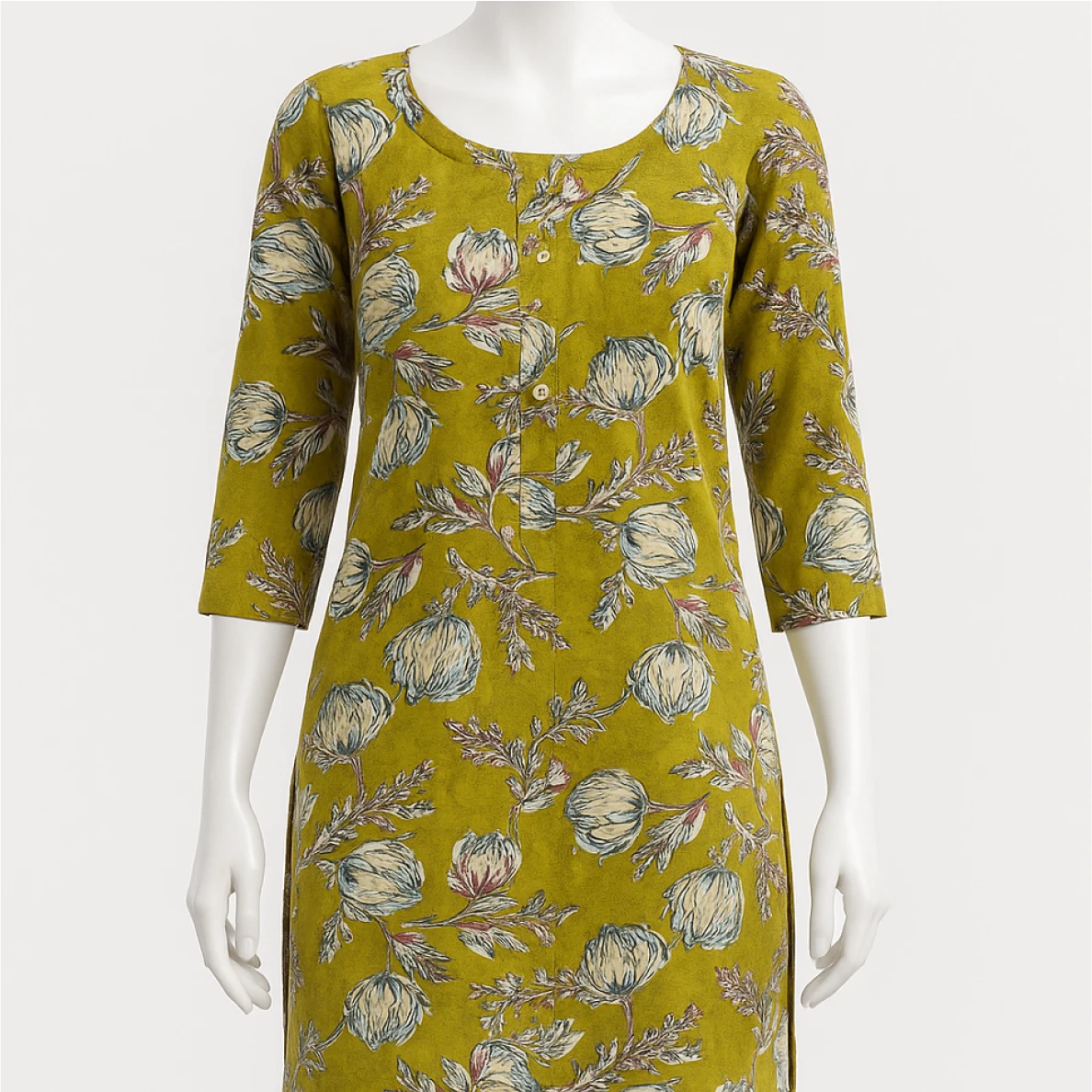 Yellow dress with floral pattern on a mannequin against a white background