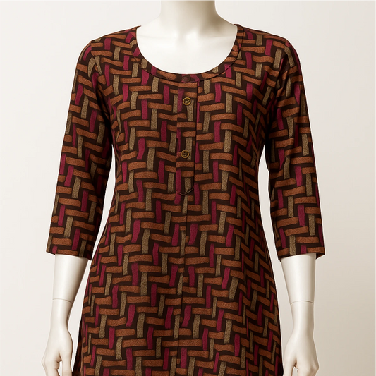 Patterned dress on a mannequin against a plain background