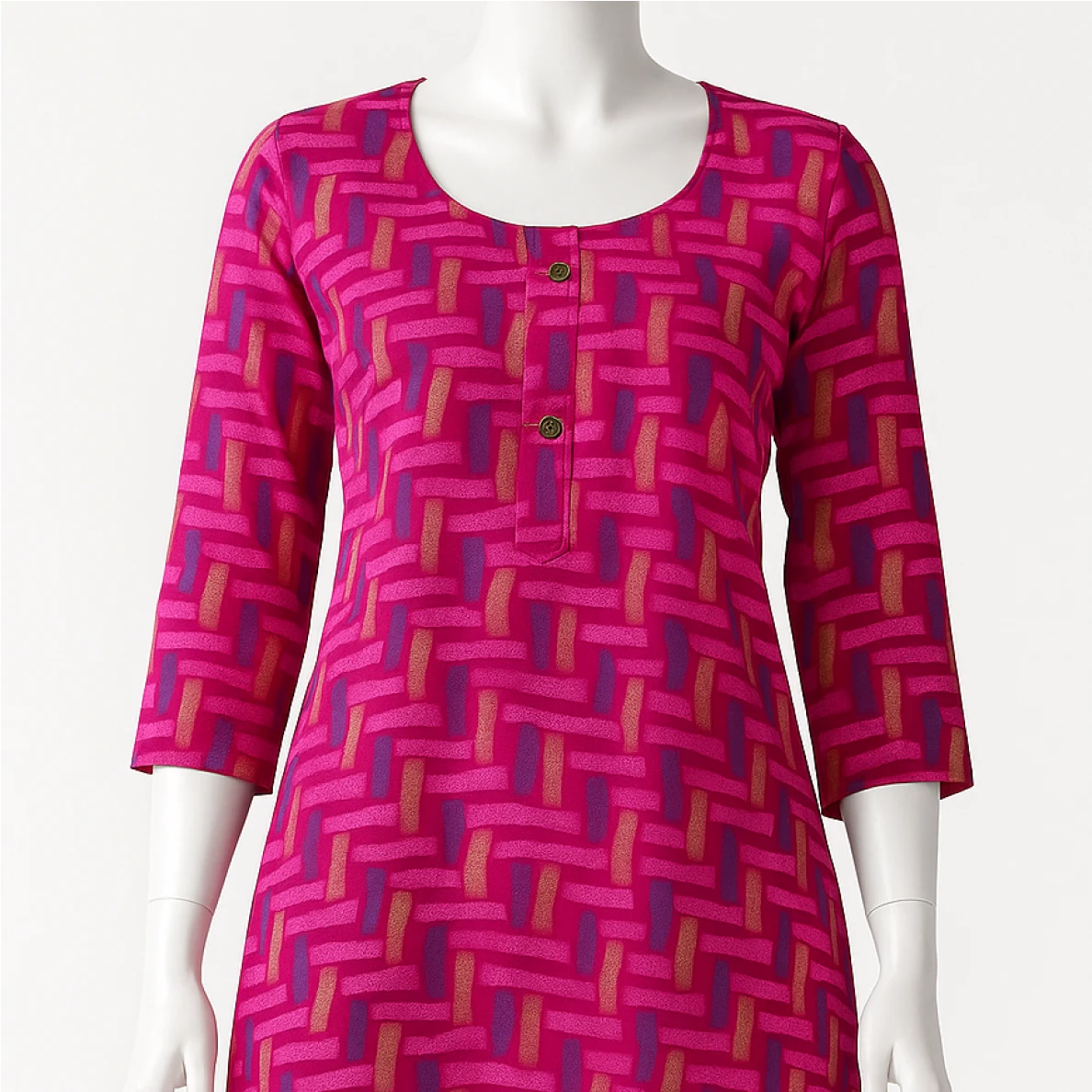Mannequin wearing a pink patterned dress on a white background