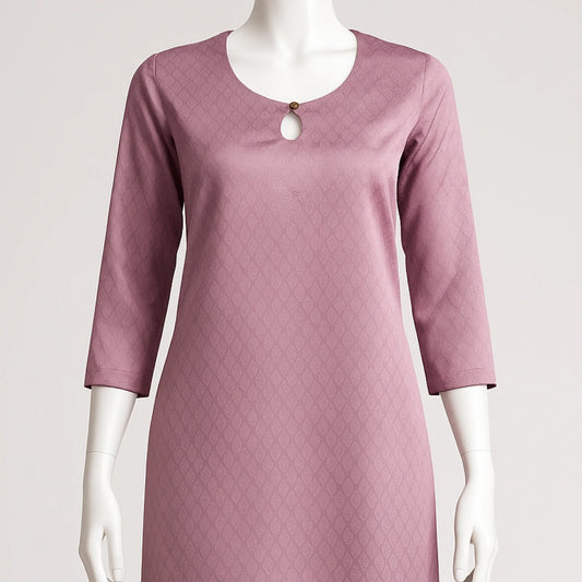 Mauve dress on a mannequin against a light gray background